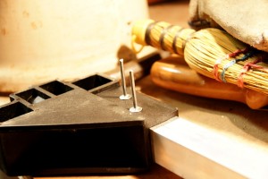 Insert a pop rivet into each hole in the bracket and tube.