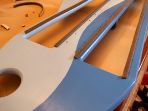 Pilot holes and support foam for the notes
