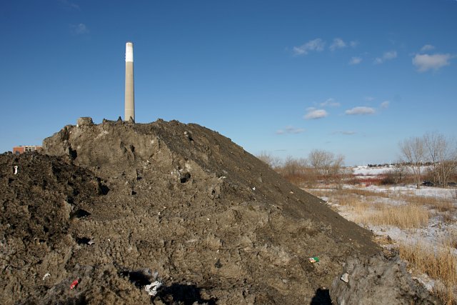 Unwin snow mountain with Hearn Station & smokestack poking out from behind