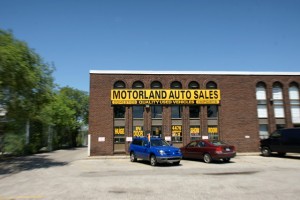 Motorland on Chesswood Drive. An apt name not only for the store, but for the entire street, which is lined with one automotive business after another.