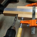 Connect the wooden crosspieces to the aluminum crosspieces with #10 self-tapping screws.