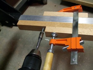 Connect the wooden crosspieces to the aluminum crosspieces with #10 self-tapping screws.