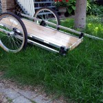 With the addition of some cabinet handles from Lee Valley Tools to provide front and back bungee tiedowns and some resistance against items rolling off the trailer, we