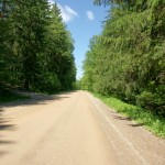 Continuing into the Real Dufferin Jog, the street becomes a dirt road along the tree-lined floor of a very quiet valley.