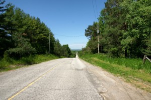 North of Highway 9, Dufferin regains its pavement and descends into the Holland Marsh.