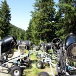 The snow making machines sit off to the side of the road, awaiting another season of action in a few months.