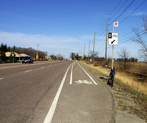 A bike lane appears on Steeles Ave. East