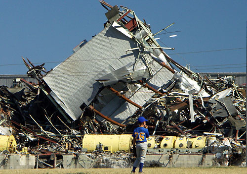 A baseball player is dwarfed by the remnants of Lakeview