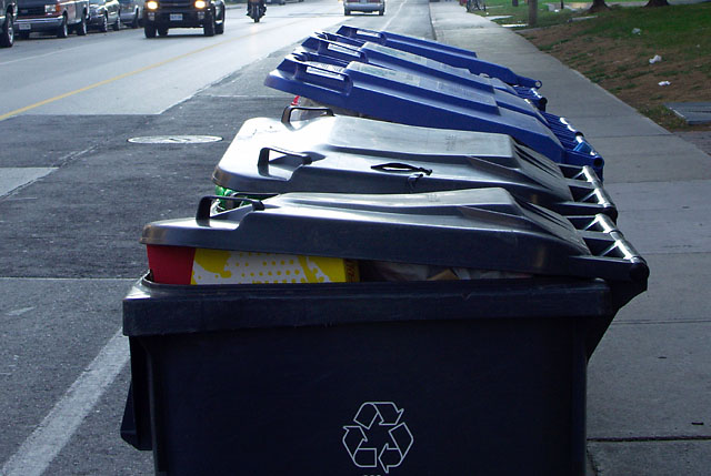 55 Cosburn Ave. uses the bike lane for garbage